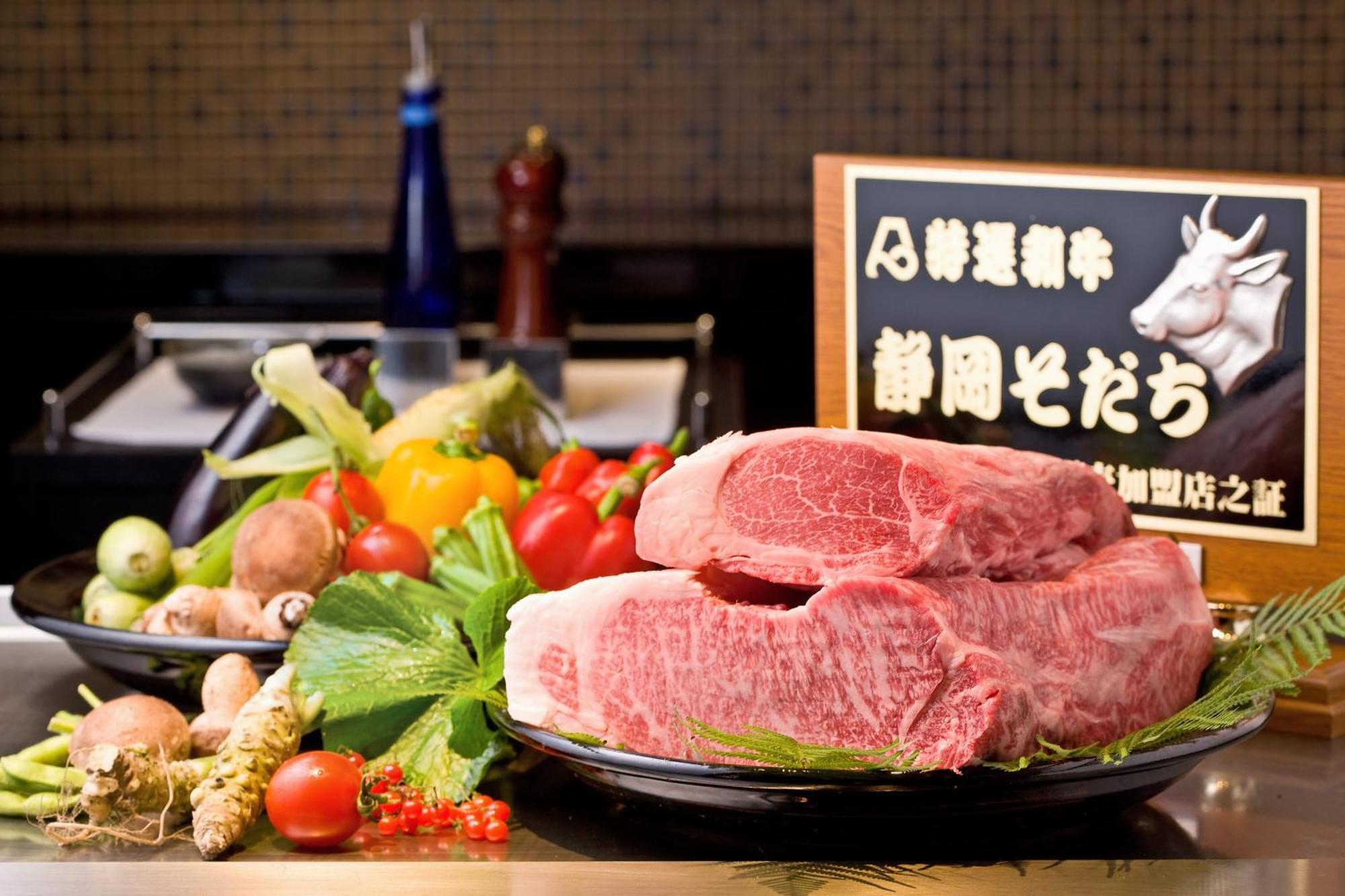 Hotel Associa Shizuoka Esterno foto A Japanese restaurant with a sign advertising the use of horse meat